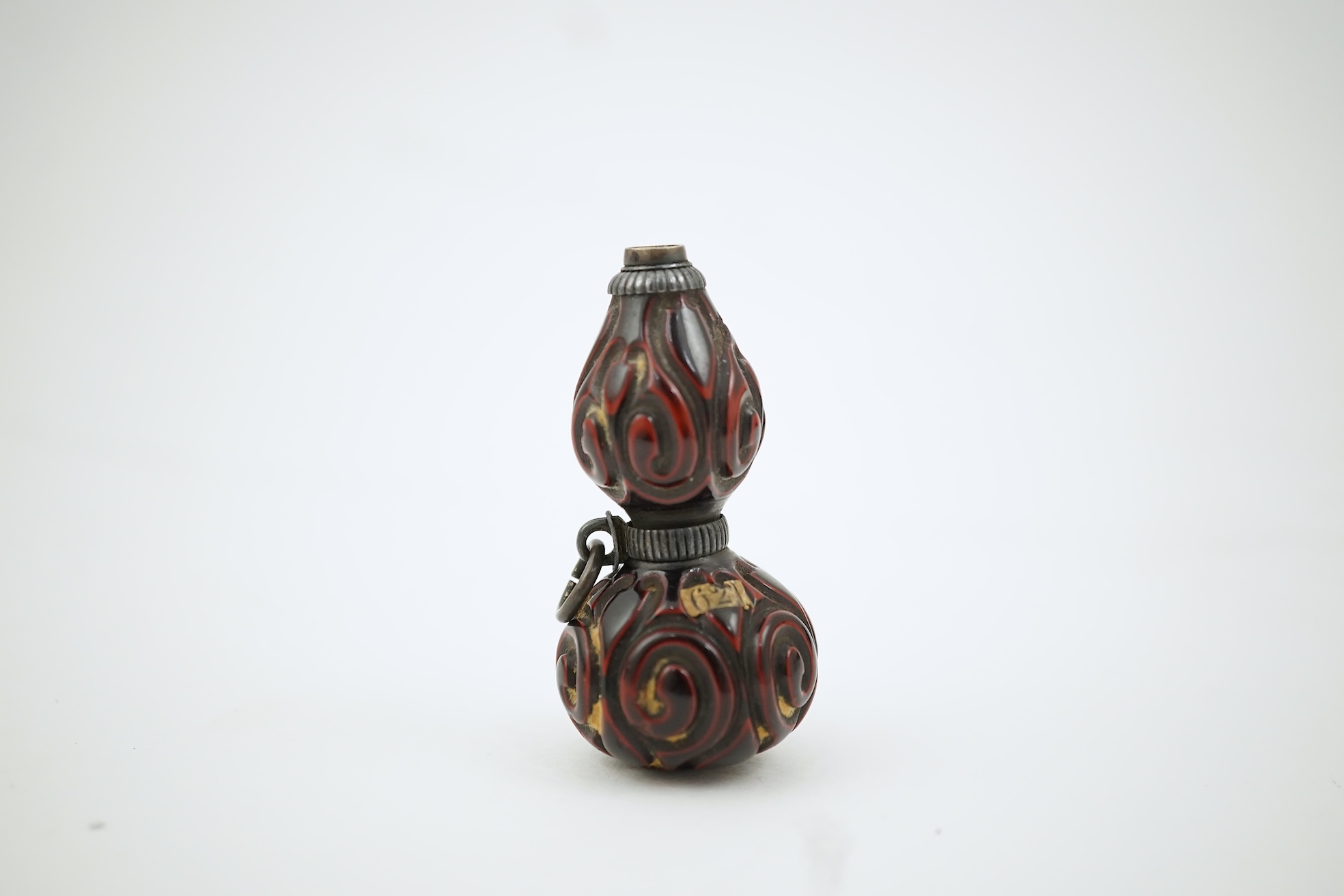 A Japanese guribori lacquer double gourd shaped netsuke, Edo period, late 18th/early 19th century